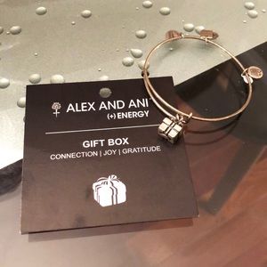 Alex and Ani silver bangle.
